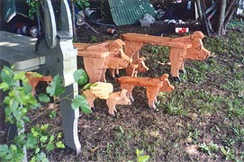 [photo, Wooden donkey and pigs, Kinder Farm Park, 1001 Kinder Farm Park Road, Millersville (Anne Arundel County), Maryland]